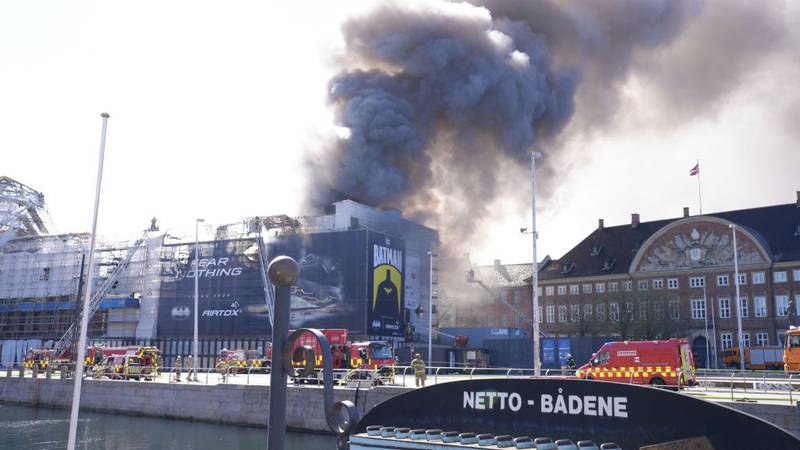 Black smoke billows from Denmark's Old Stock Exchange building.