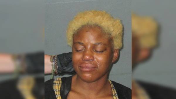 Louisiana woman charged with attempted murder after lying in street with baby, police say